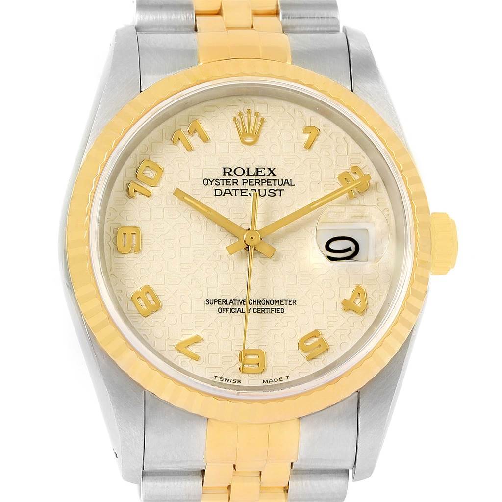 This image shows a Rolex Datejust 16233 Men's Steel and Gold (two tone) Beige Dial 16233 Men's Steel and Gold (two tone) Beige Dial watch from a front angle, highlighting the dial, bezel, hands, and part of the bracelet.
