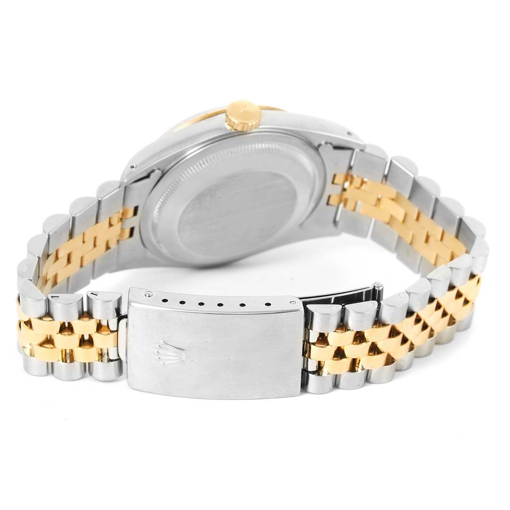 This image shows the back view of a Rolex Datejust 16233 Men's Steel and Gold (two tone) Beige Dial 16233 Men's Steel and Gold (two tone) Beige Dial watch, focusing on the case back and a two-tone bracelet with the clasp.