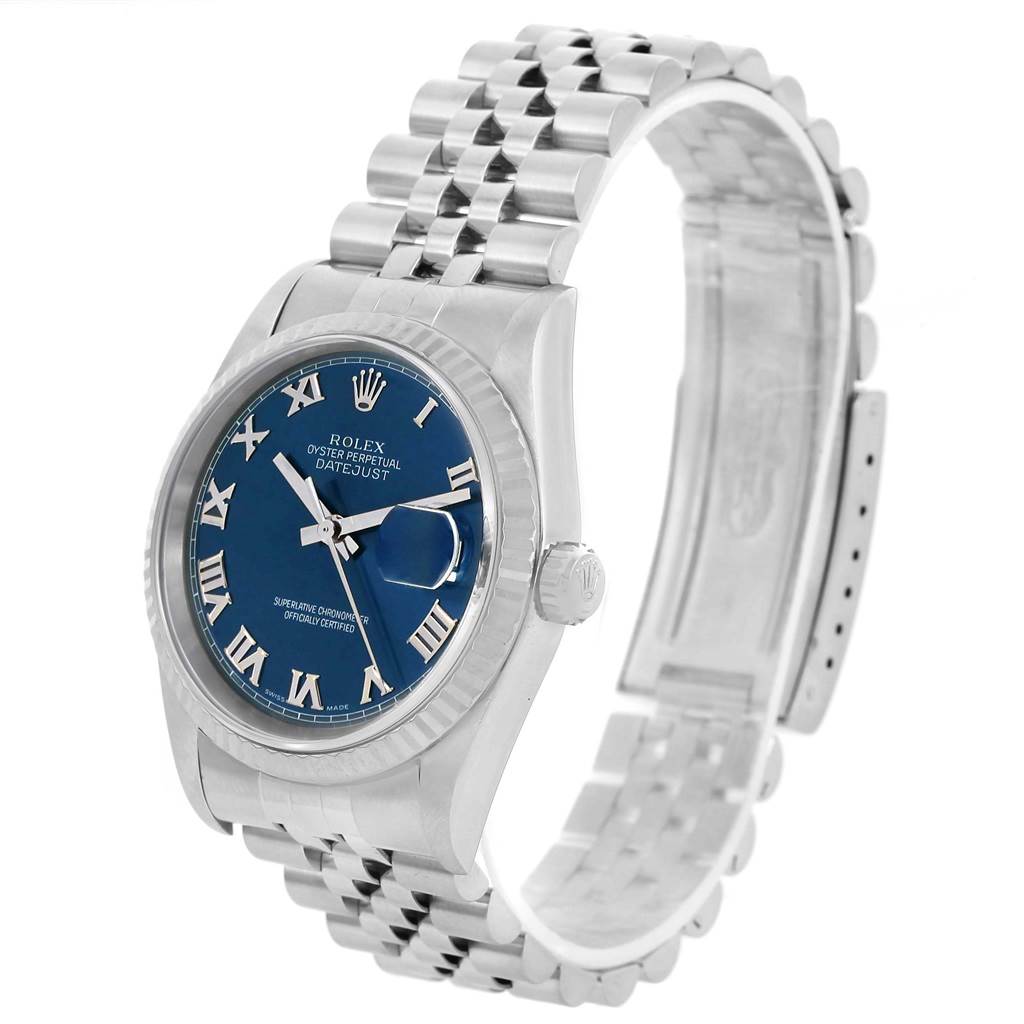 The Rolex Datejust 16234 Men's Stainless Steel Blue Dial 16234 Men's Stainless Steel Blue Dial watch is shown from a side angle, displaying its face, bracelet, and partially open clasp.