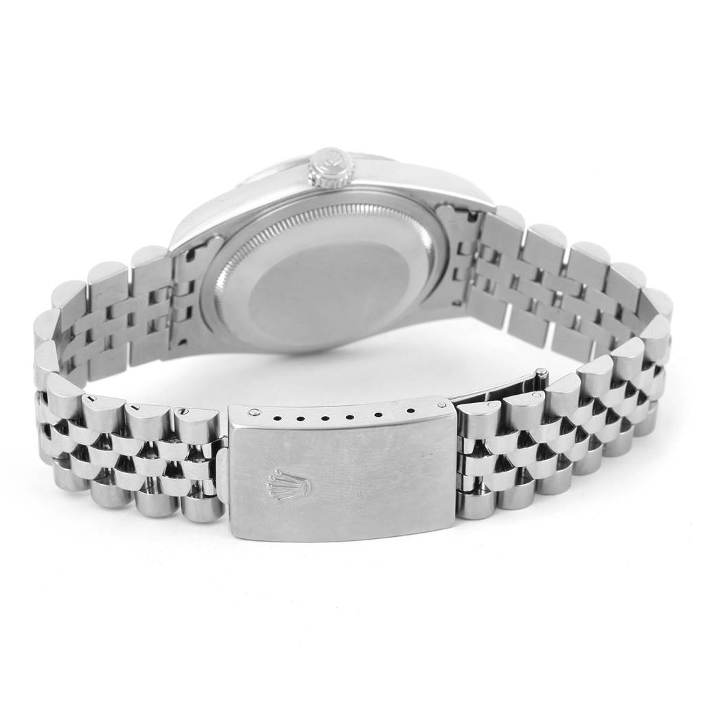 The image shows the back view of a Rolex Datejust 16234 Men's Stainless Steel Blue Dial 16234 Men's Stainless Steel Blue Dial watch with its case back, crown, and Jubilee bracelet with the clasp visible.