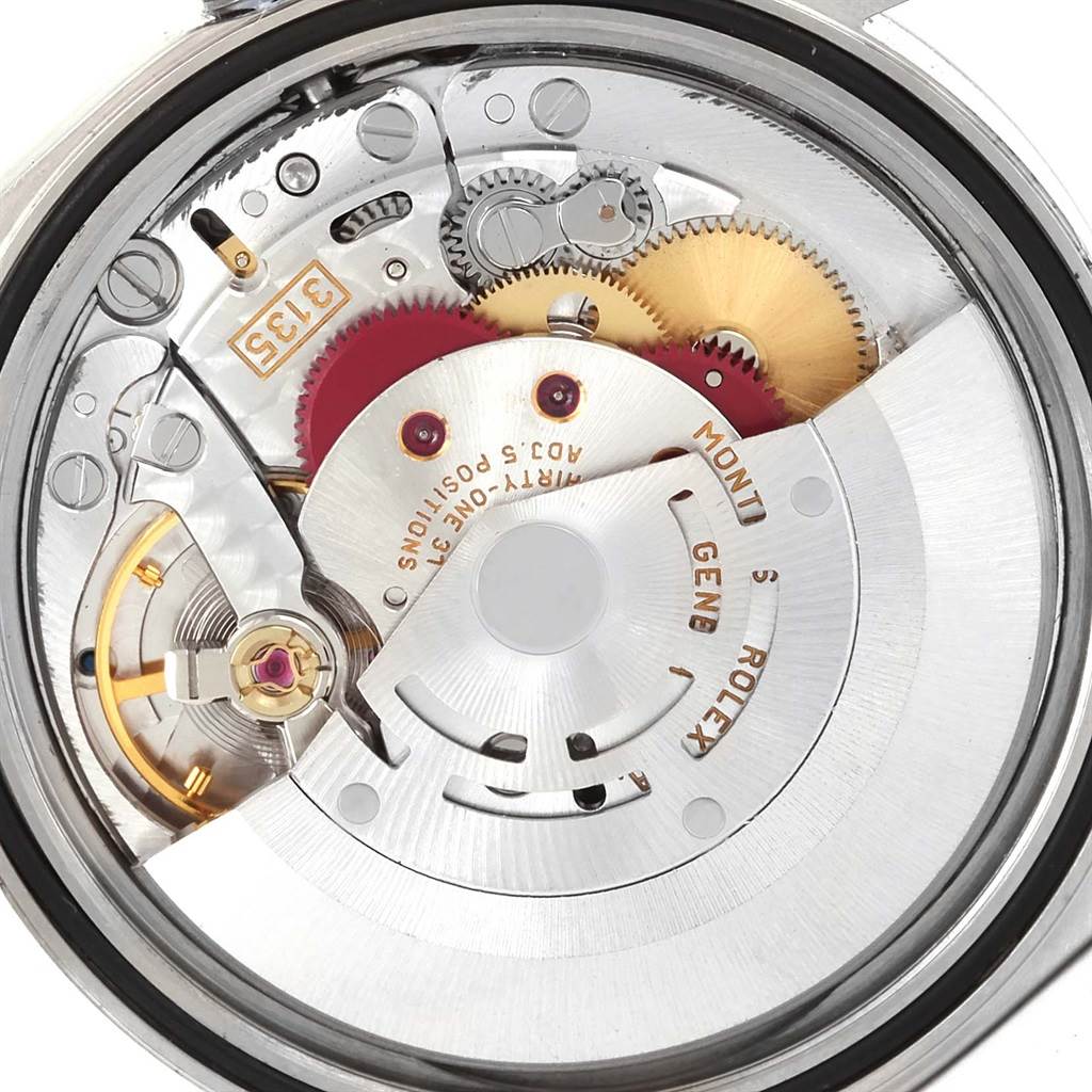 This image shows the inner mechanical movement of a Rolex Datejust 16234 Men
s Stainless Steel White Dial 16234 Men
s Stainless Steel White Dial watch with gears and components visible from the back.