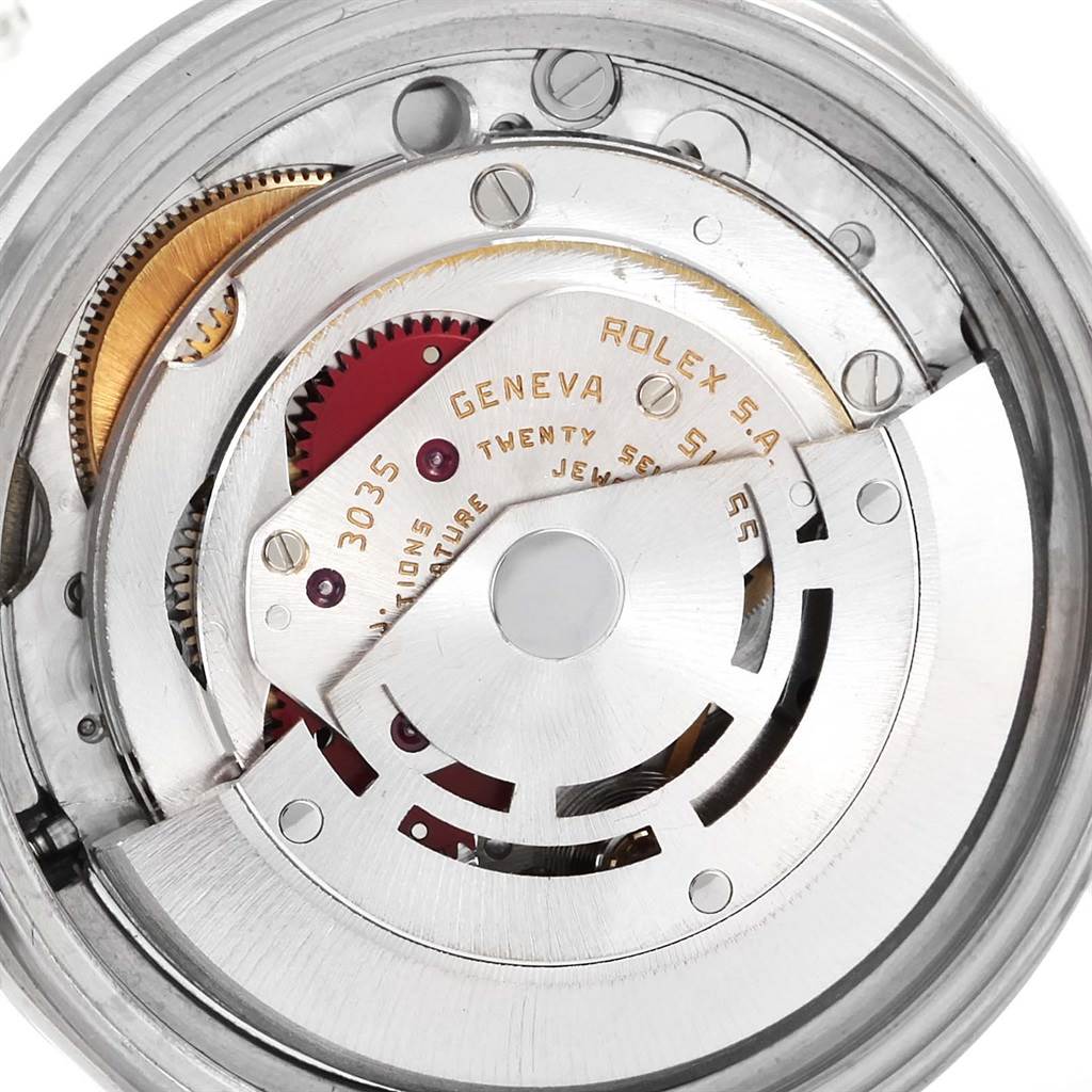 This image shows a close-up of the internal movement of a Rolex Datejust 16030 Men's Stainless Steel Silver Dial 16030 Men's Stainless Steel Silver Dial watch, revealing the gears and intricate components.