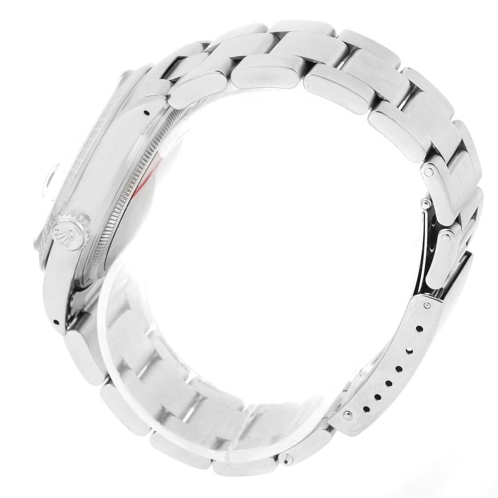 The image shows a side view of the Rolex Datejust 16030 Men's Stainless Steel Silver Dial 16030 Men's Stainless Steel Silver Dial watch, highlighting its metal bracelet, clasp, and crown.