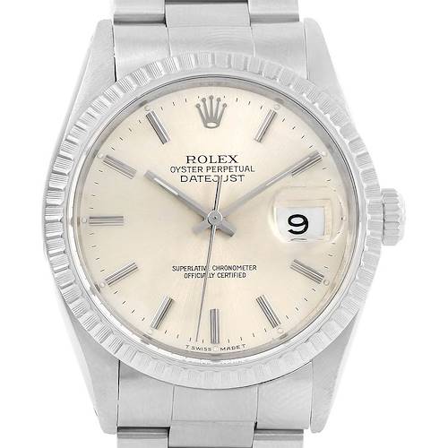 The image shows a Rolex Datejust model watch from a front angle, displaying the dial, bezel, and part of the bracelet.