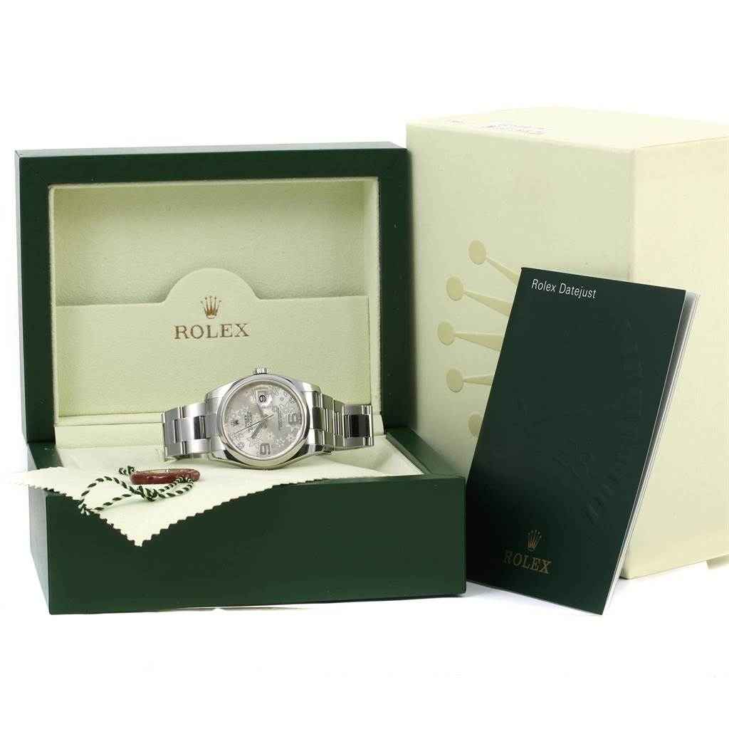 The Rolex Datejust 116200 Men
s Stainless Steel Silver Dial 116200 Men
s Stainless Steel Silver Dial model watch is shown from the front in its open box, with a warranty booklet and outer box beside it.