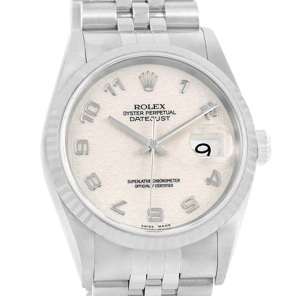 The image shows a front view of the Rolex Datejust 16234 Men's Stainless Steel Silver Dial 16234 Men's Stainless Steel Silver Dial watch, highlighting the dial, hands, date, and part of the bracelet.