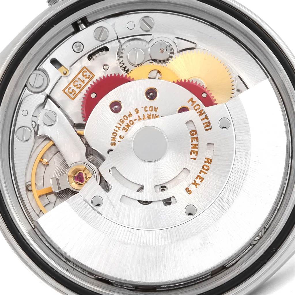 The image shows the internal mechanism of the Rolex Datejust 16220 Men's Stainless Steel Silver Dial 16220 Men's Stainless Steel Silver Dial model, specifically the movement and various gears.