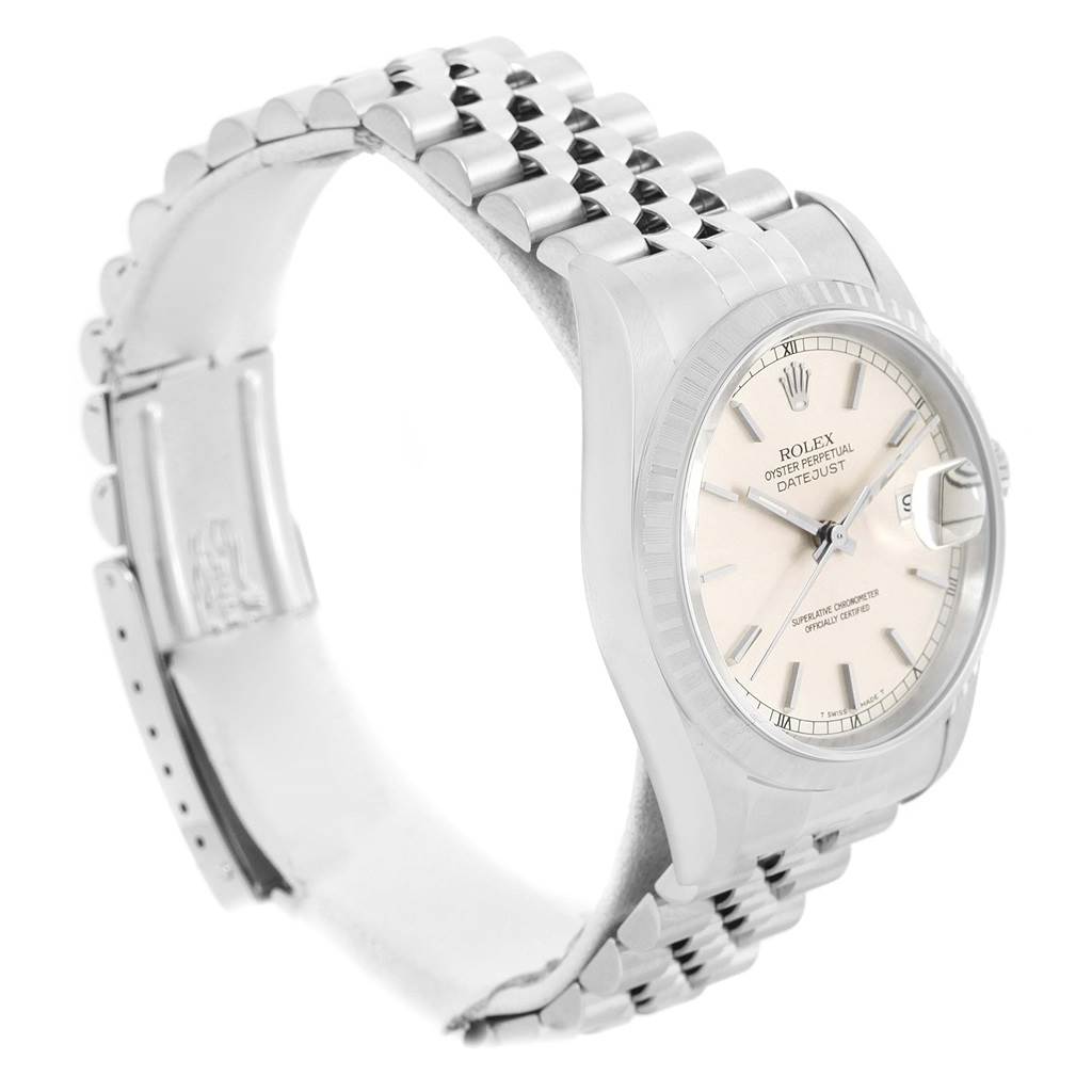 The image shows a side angle of a Rolex Datejust 16220 Men's Stainless Steel Silver Dial 16220 Men's Stainless Steel Silver Dial watch, highlighting the bracelet, clasp, and watch face.