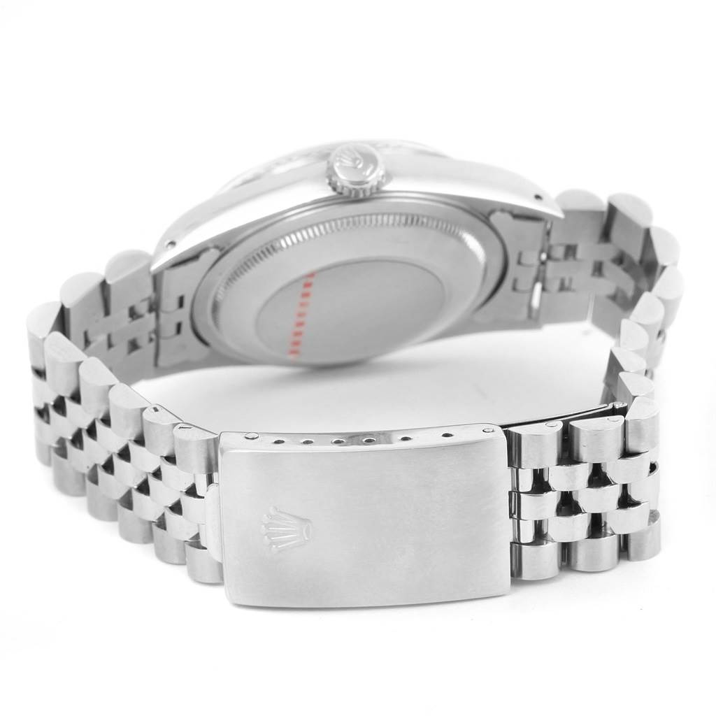 This image shows the Rolex Datejust 16234 Men's Stainless Steel White Dial 16234 Men's Stainless Steel White Dial watch from the back, highlighting the clasp, bracelet, and caseback.