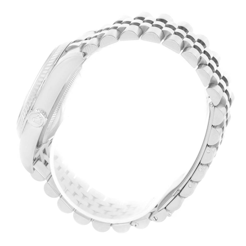 This Rolex Datejust 116234 Men
s Stainless Steel Black Dial 116234 Men
s Stainless Steel Black Dial watch is shown from a side angle featuring the case and bracelet.