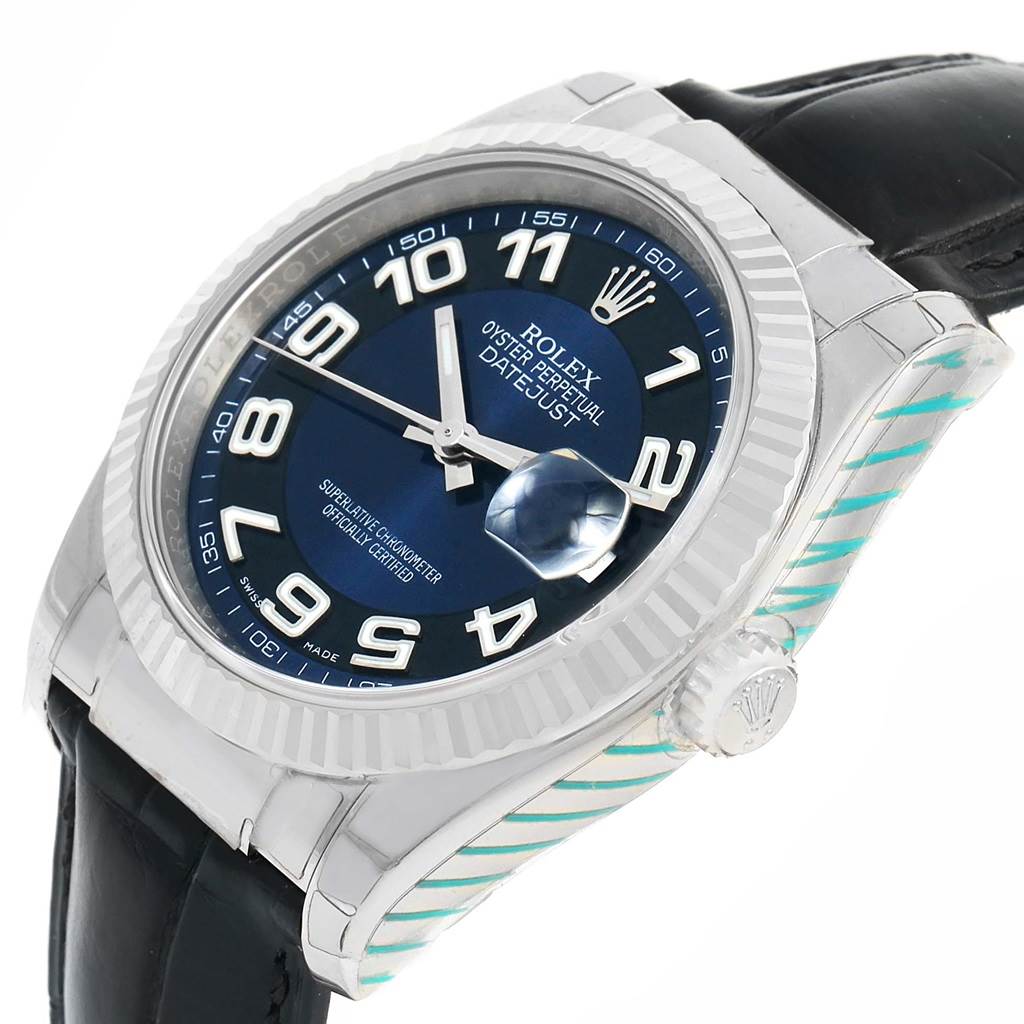 The image shows a Rolex Datejust 116139 Men's White Gold Blue Dial 116139 Men's White Gold Blue Dial watch from an angled side view, highlighting the face, bezel, crown, and strap.