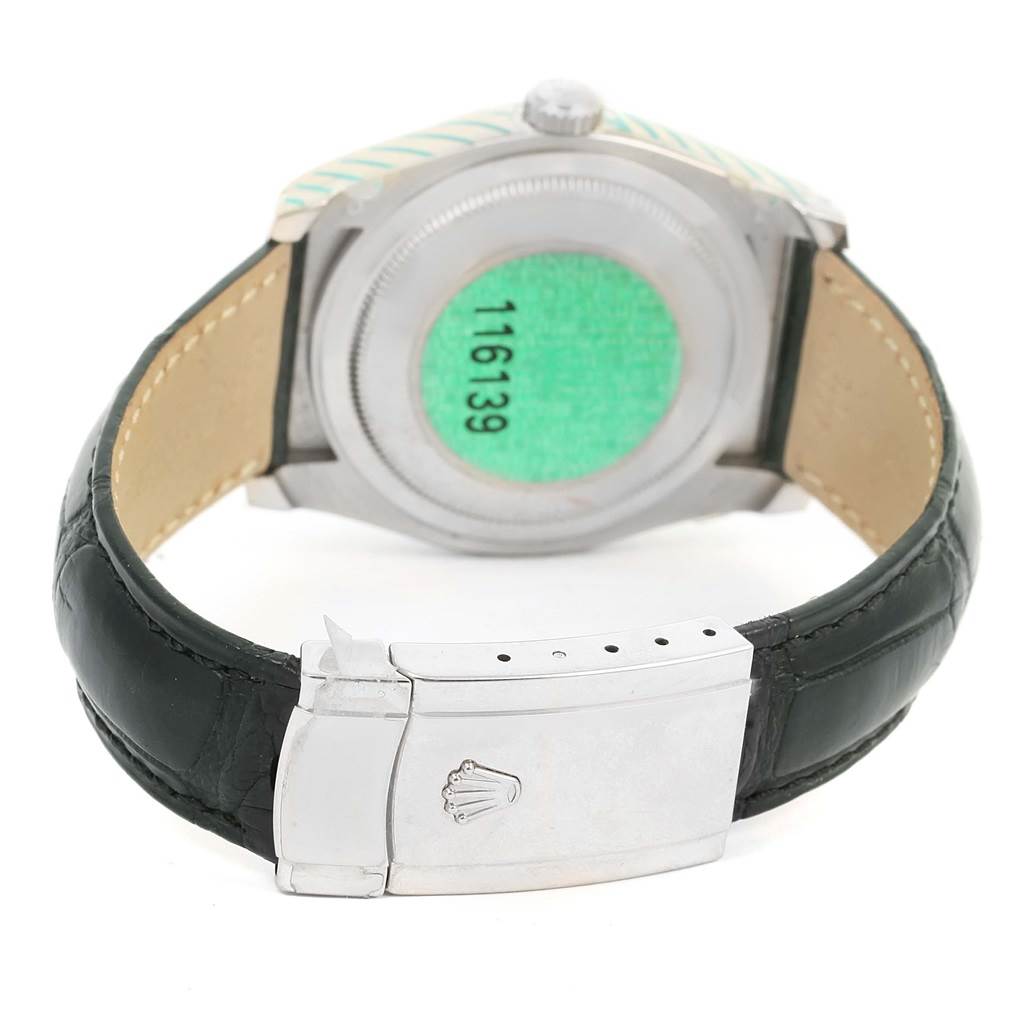 The image shows the back and clasp of a Rolex Datejust 116139 Men's White Gold Blue Dial 116139 Men's White Gold Blue Dial watch, including the leather strap and case back.