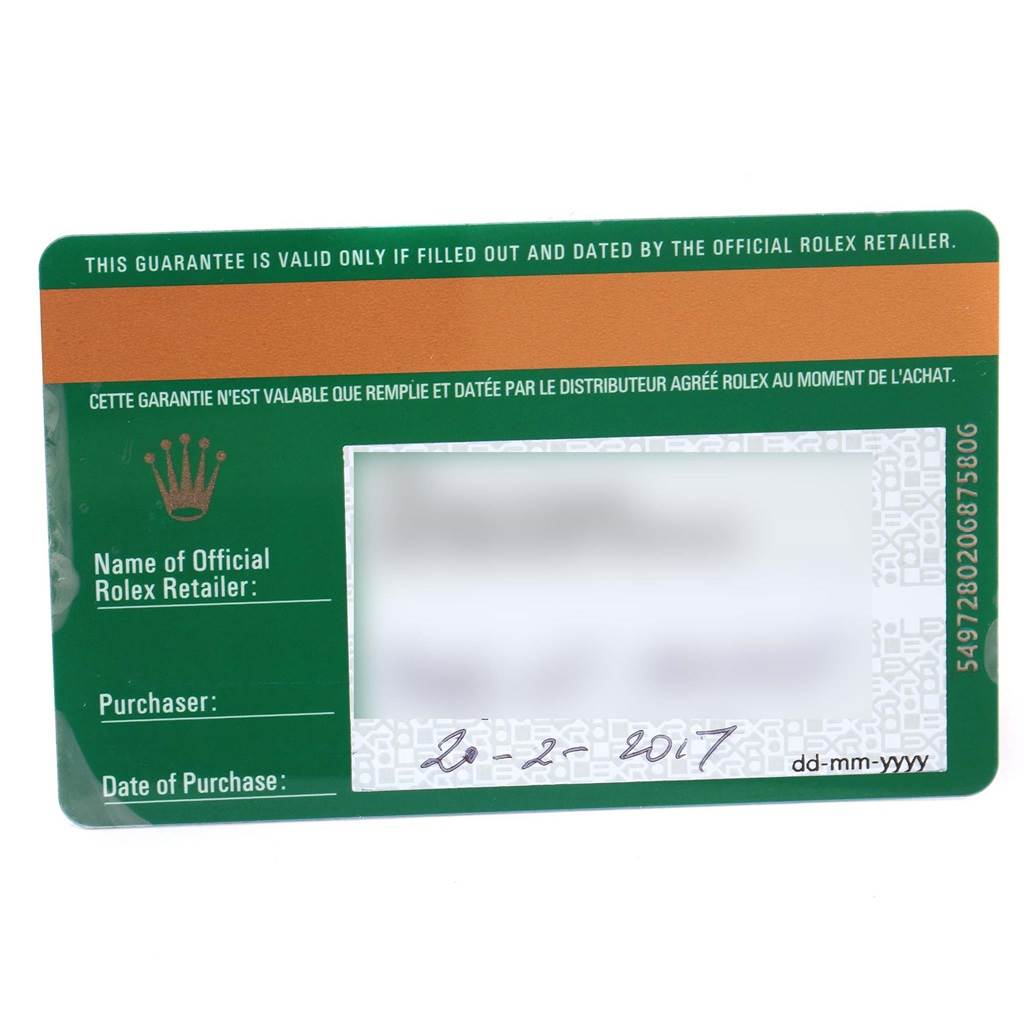 This image shows a Rolex Datejust 116139 Men's White Gold Blue Dial 116139 Men's White Gold Blue Dial model warranty card with green and orange sections, and spaces for retailer and purchase details.