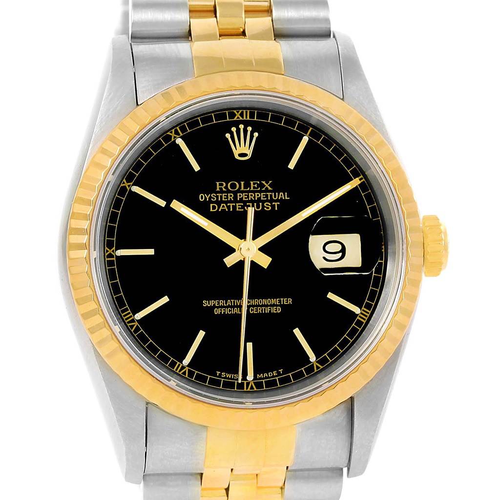 The Rolex Datejust 16233 Men's Steel and Gold (two tone) Black Dial 16233 Men's Steel and Gold (two tone) Black Dial watch is shown from a front angle, displaying its bezel, dial, hands, date window, and a portion of the bracelet.