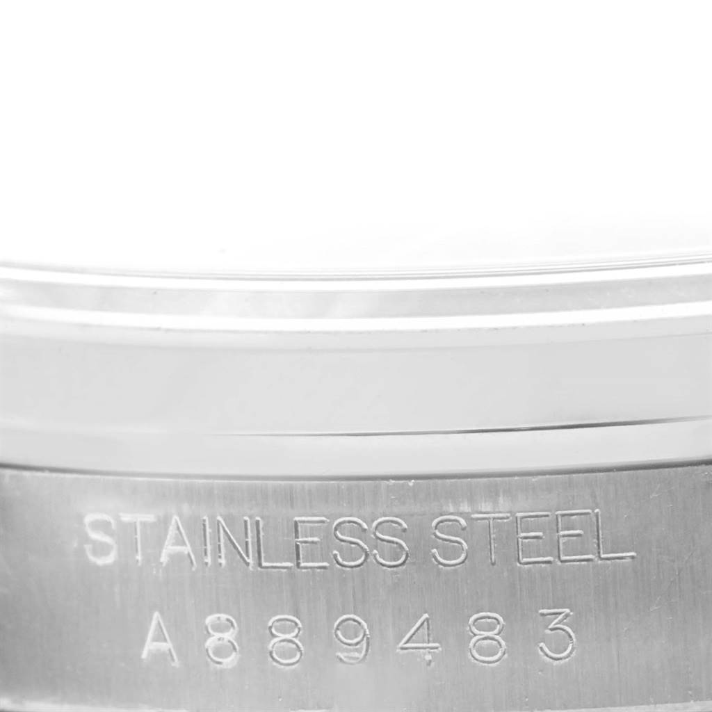 This close-up image shows the stainless steel case back with the serial number of a Rolex Datejust 16200 Men's Stainless Steel Blue Dial 16200 Men's Stainless Steel Blue Dial watch.