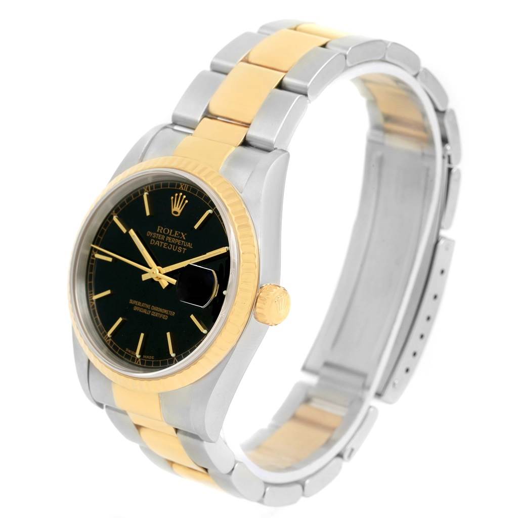 This image shows a Rolex Datejust 16233 Men's Steel and Gold (two tone) Black Dial 16233 Men's Steel and Gold (two tone) Black Dial watch at a three-quarter angle, highlighting its black dial, two-tone bracelet, and crown.