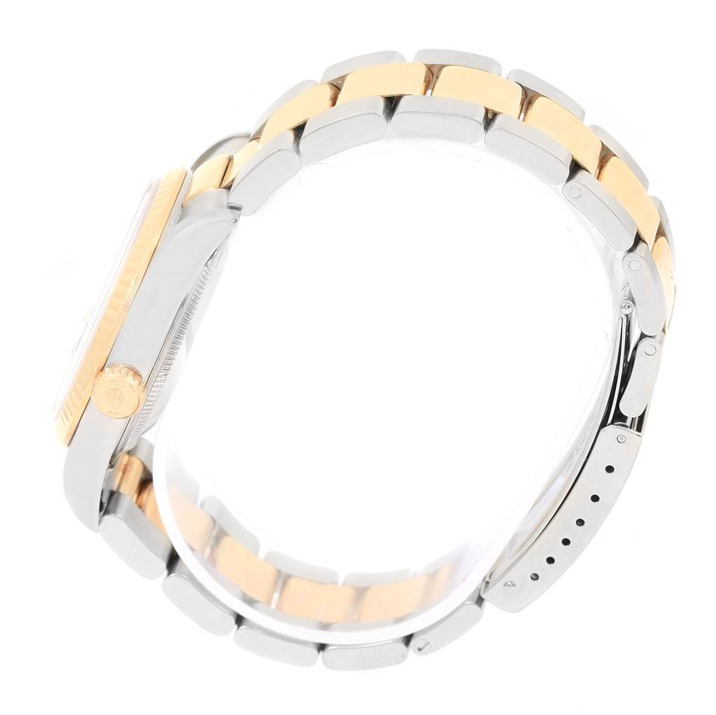 The image shows a side view of a Rolex Datejust 16233 Men's Steel and Gold (two tone) Black Dial 16233 Men's Steel and Gold (two tone) Black Dial watch, highlighting the case, the crown, and the two-tone bracelet.