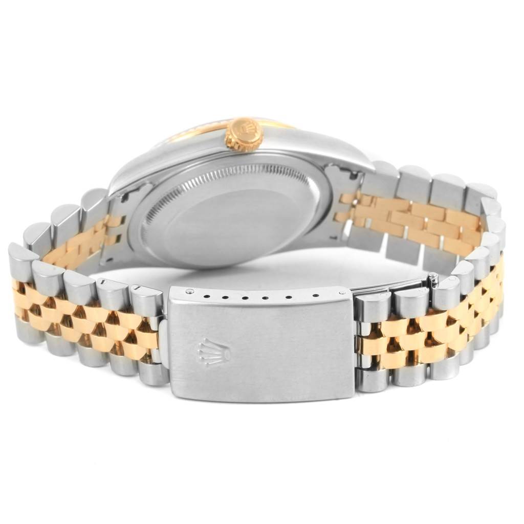 The image shows the case back, crown, and two-tone Jubilee bracelet of the Rolex Datejust 16233 Men's Steel and Gold (two tone) Blue Dial 16233 Men's Steel and Gold (two tone) Blue Dial watch.