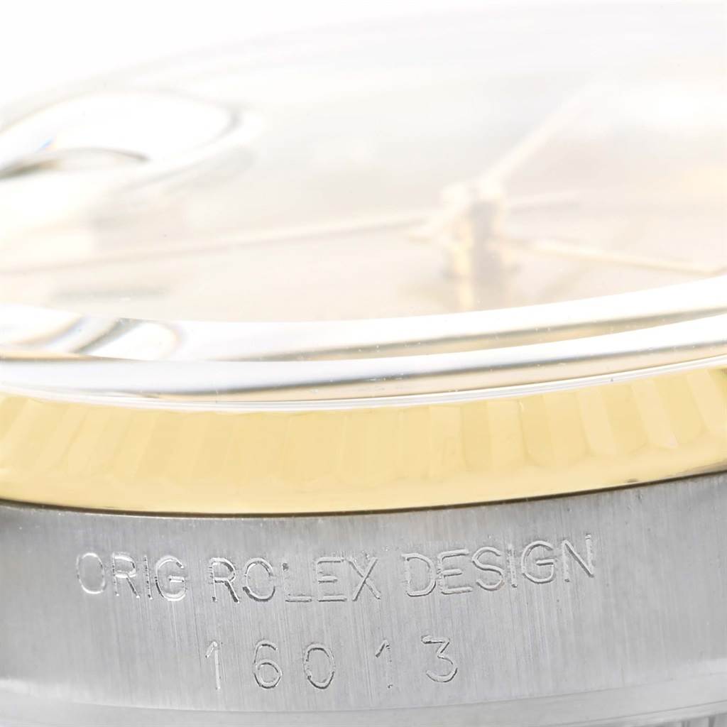 The image shows a close-up side angle of the Datejust model by Rolex, revealing the engraved design and model number 16013.
