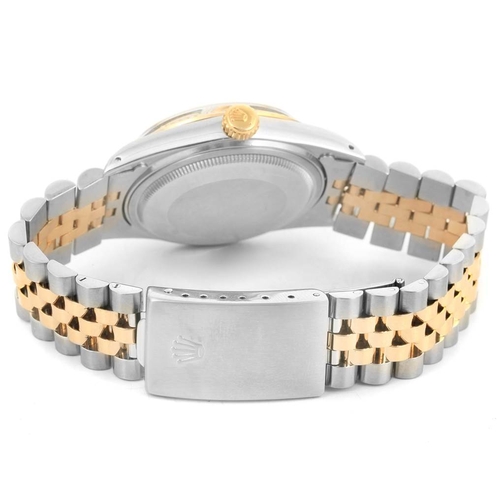 This image shows the back view of the Rolex Datejust 16013 Men
s Stainless Steel Champagne Dial 16013 Men
s Stainless Steel Champagne Dial watch, highlighting its bracelet and clasp.