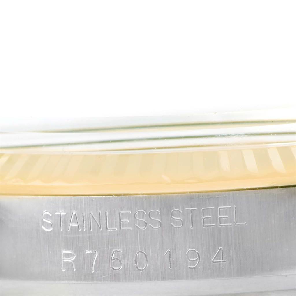 The image shows a close-up of the stainless steel case back edge and screw-down case of a Rolex Datejust 16013 Men
s Stainless Steel Champagne Dial 16013 Men
s Stainless Steel Champagne Dial watch.