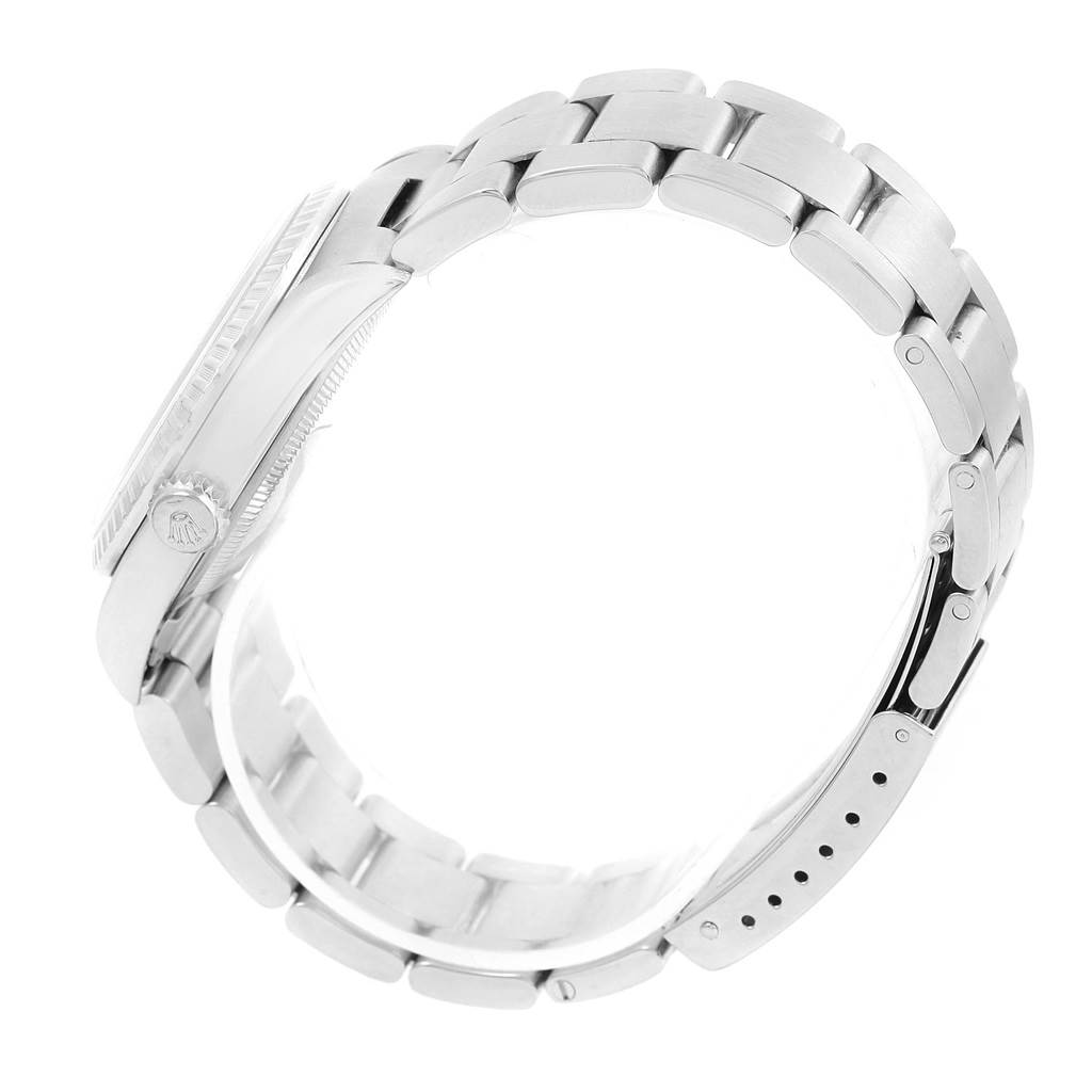 The image shows a side view of the Datejust model by Rolex, highlighting the bracelet and the watch case.