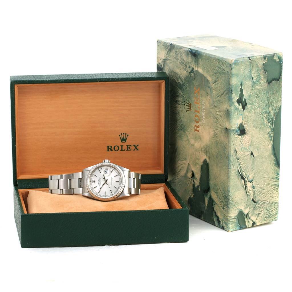 The image shows a Rolex Datejust 16220 Men's Stainless Steel Silver Dial 16220 Men's Stainless Steel Silver Dial watch at a front angle inside its open green box, alongside the outer green box.