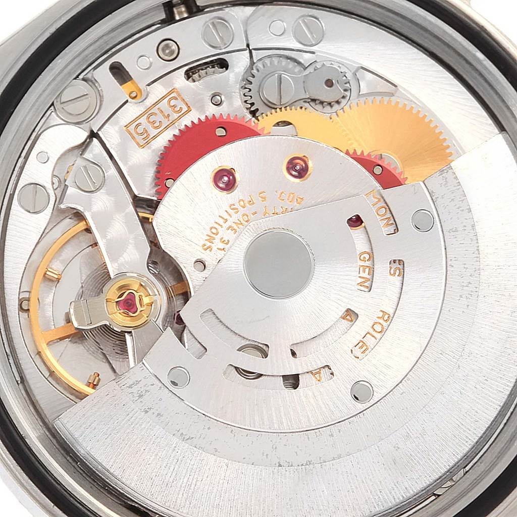 This image shows a close-up of the movement mechanism of a Rolex Datejust 16233 Men
s Steel and Gold (two tone) Silver Dial 16233 Men
s Steel and Gold (two tone) Silver Dial watch.