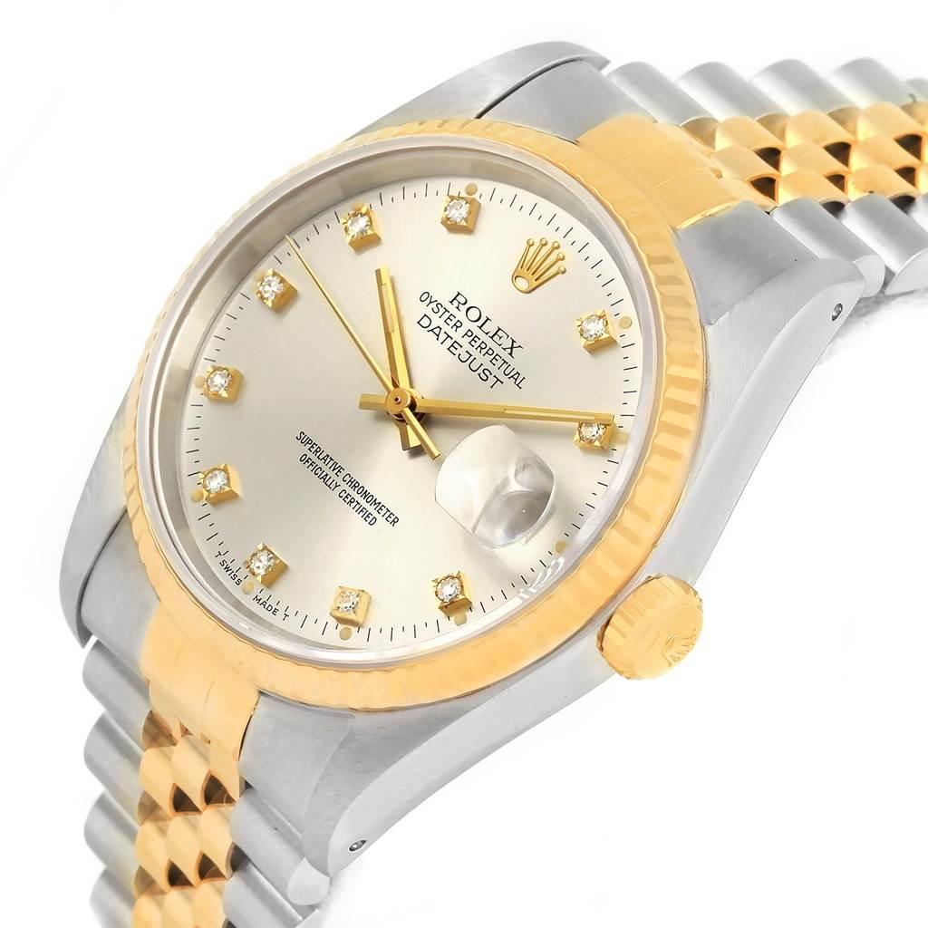 This image shows a close-up angled view of a Rolex Datejust 16233 Men
s Steel and Gold (two tone) Silver Dial 16233 Men
s Steel and Gold (two tone) Silver Dial watch, highlighting the dial, fluted bezel, and part of the jubilee bracelet.