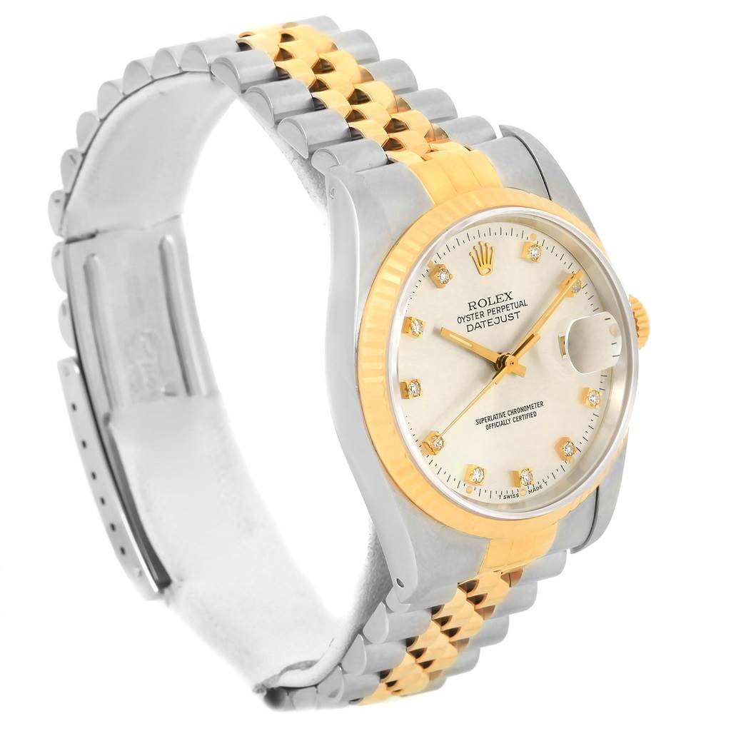 The image shows a Rolex Datejust 16233 Men
s Steel and Gold (two tone) Silver Dial 16233 Men
s Steel and Gold (two tone) Silver Dial watch from an angled side view, highlighting its two-tone bracelet and dial.