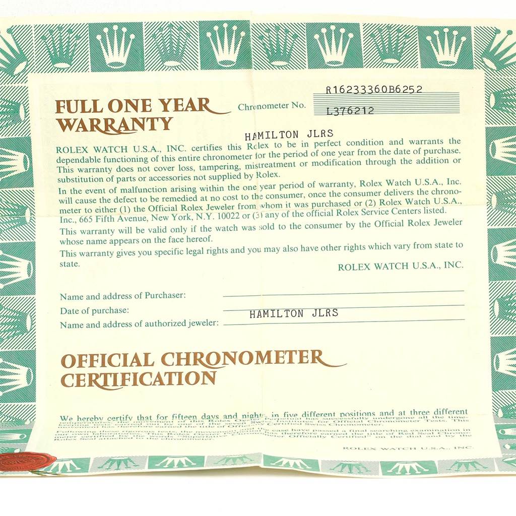 The image shows the warranty and chronometer certification for a Rolex Datejust 16233 Men
s Steel and Gold (two tone) Silver Dial 16233 Men
s Steel and Gold (two tone) Silver Dial model watch.