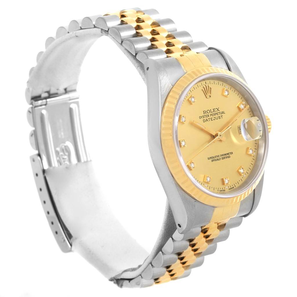 The Rolex Datejust 16233 Men
s Steel and Gold (two tone) Champagne Dial 16233 Men
s Steel and Gold (two tone) Champagne Dial watch is shown at an angle highlighting its bezel, face, and two-tone bracelet.