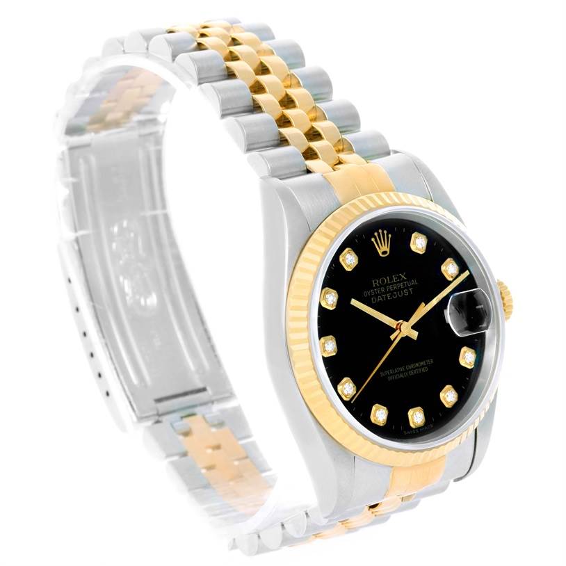 This image shows a Rolex Datejust 16233 Men's Steel and Gold (two tone) Black Dial 16233 Men's Steel and Gold (two tone) Black Dial watch at an angle showcasing its face, bezel, and two-tone bracelet.