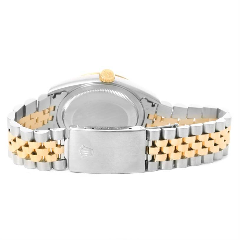 This image shows the back view of the Rolex Datejust 16233 Men's Steel and Gold (two tone) Black Dial 16233 Men's Steel and Gold (two tone) Black Dial watch with its two-tone bracelet and clasp.