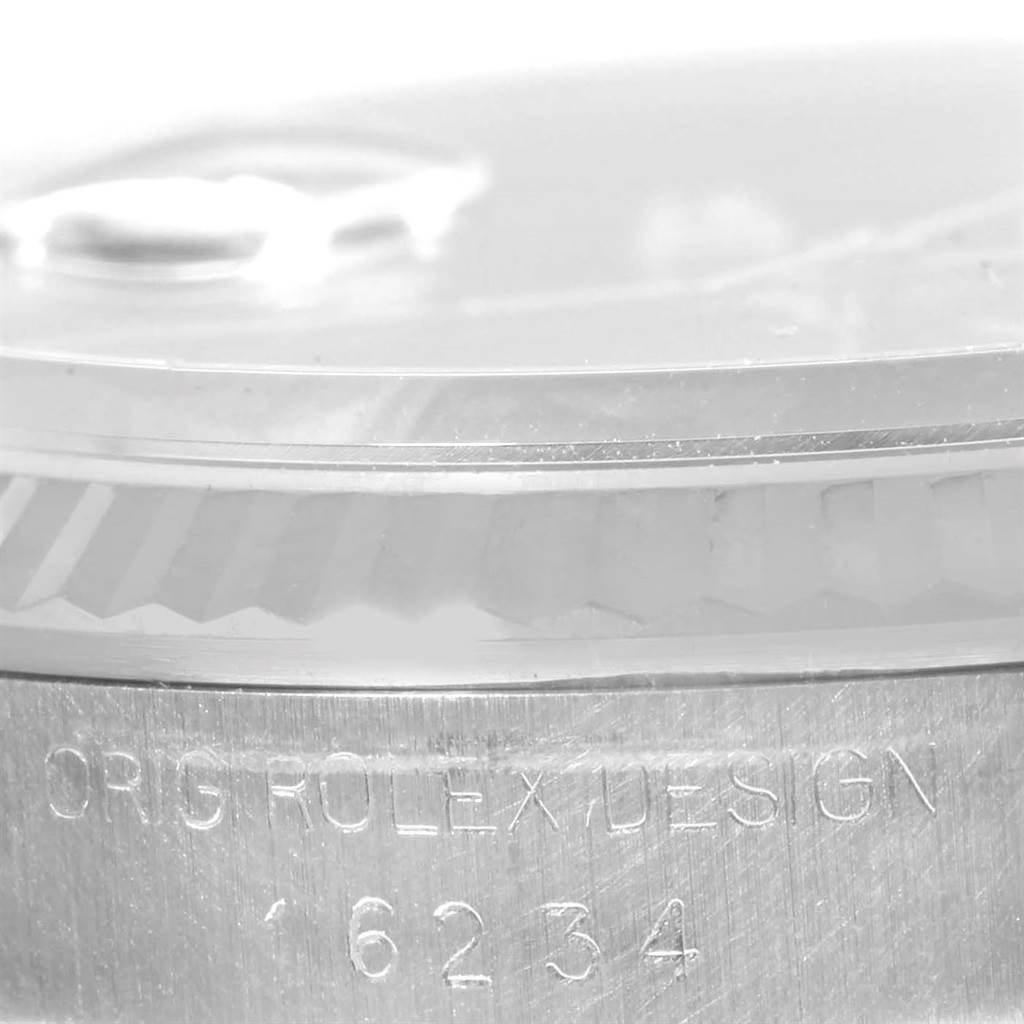 This close-up angle shows the side view of a Rolex Datejust 16234 Men
s Stainless Steel Black Dial 16234 Men
s Stainless Steel Black Dial watch with model number 16234 and engraved branding.