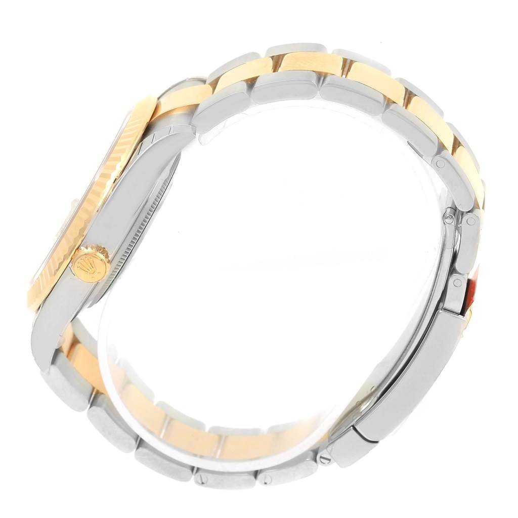 This image shows a side profile of a Rolex Datejust 126333 Men's Steel and Gold (two tone) White Dial 126333 Men's Steel and Gold (two tone) White Dial watch, focusing on the case, crown, and wristband.