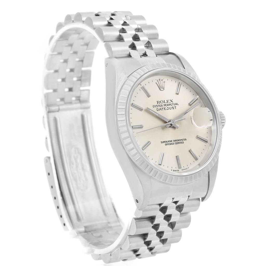 The Rolex Datejust 16220 Men
s Stainless Steel Silver Dial 16220 Men
s Stainless Steel Silver Dial watch is shown at a slight angle, highlighting the face, bezel, and part of the bracelet.