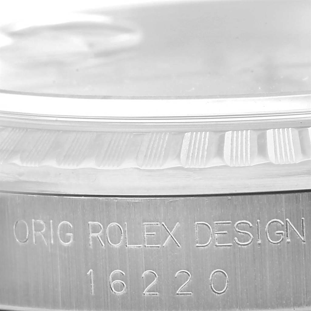 This image shows a close-up of the case side and bezel of a Rolex Datejust 16220 Men
s Stainless Steel Silver Dial 16220 Men
s Stainless Steel Silver Dial model, highlighting the engraved serial number 16220.