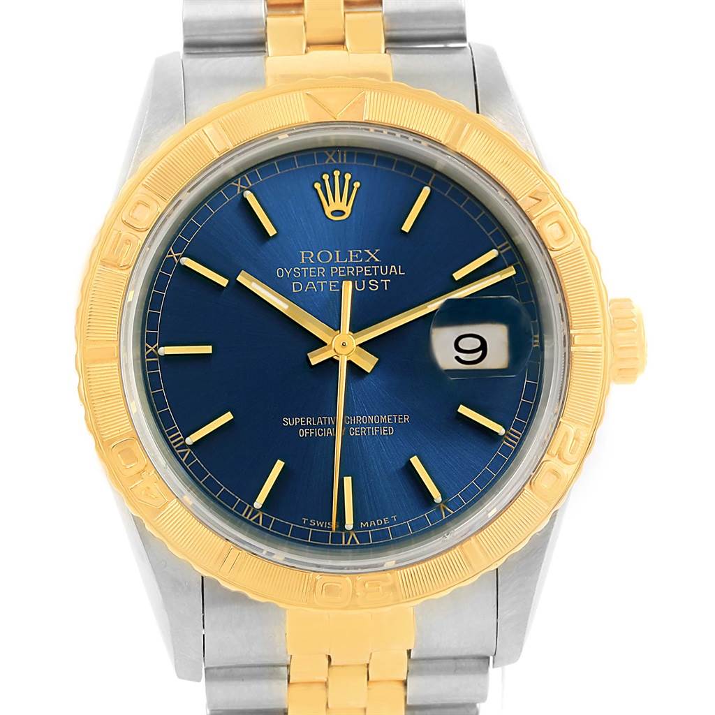 The image shows the front view of a Rolex Datejust 16263 Men's Steel and Gold (two tone) Blue Dial 16263 Men's Steel and Gold (two tone) Blue Dial watch, highlighting the dial, hands, bezel, and part of the bracelet.