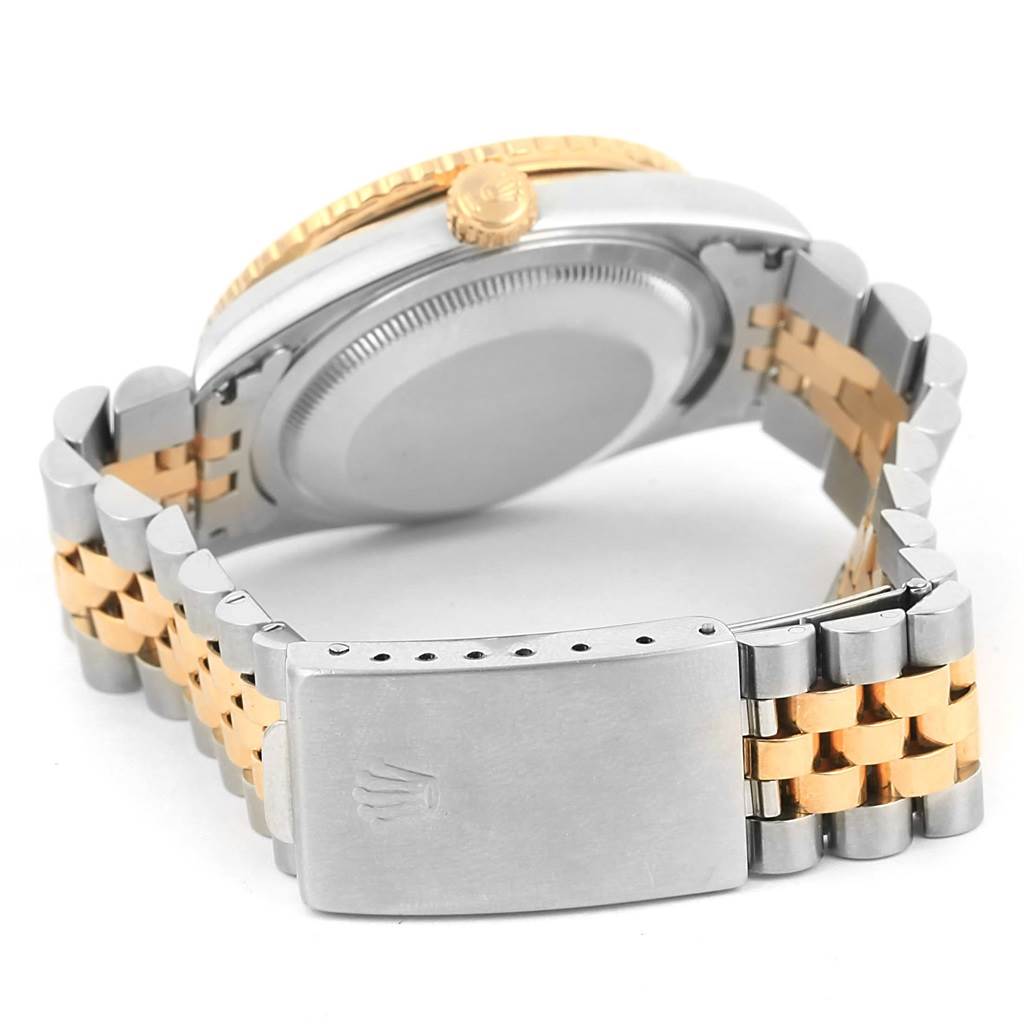 The image shows the side and back of a Rolex Datejust 16263 Men's Steel and Gold (two tone) Blue Dial 16263 Men's Steel and Gold (two tone) Blue Dial watch, highlighting its two-tone bracelet and clasp.