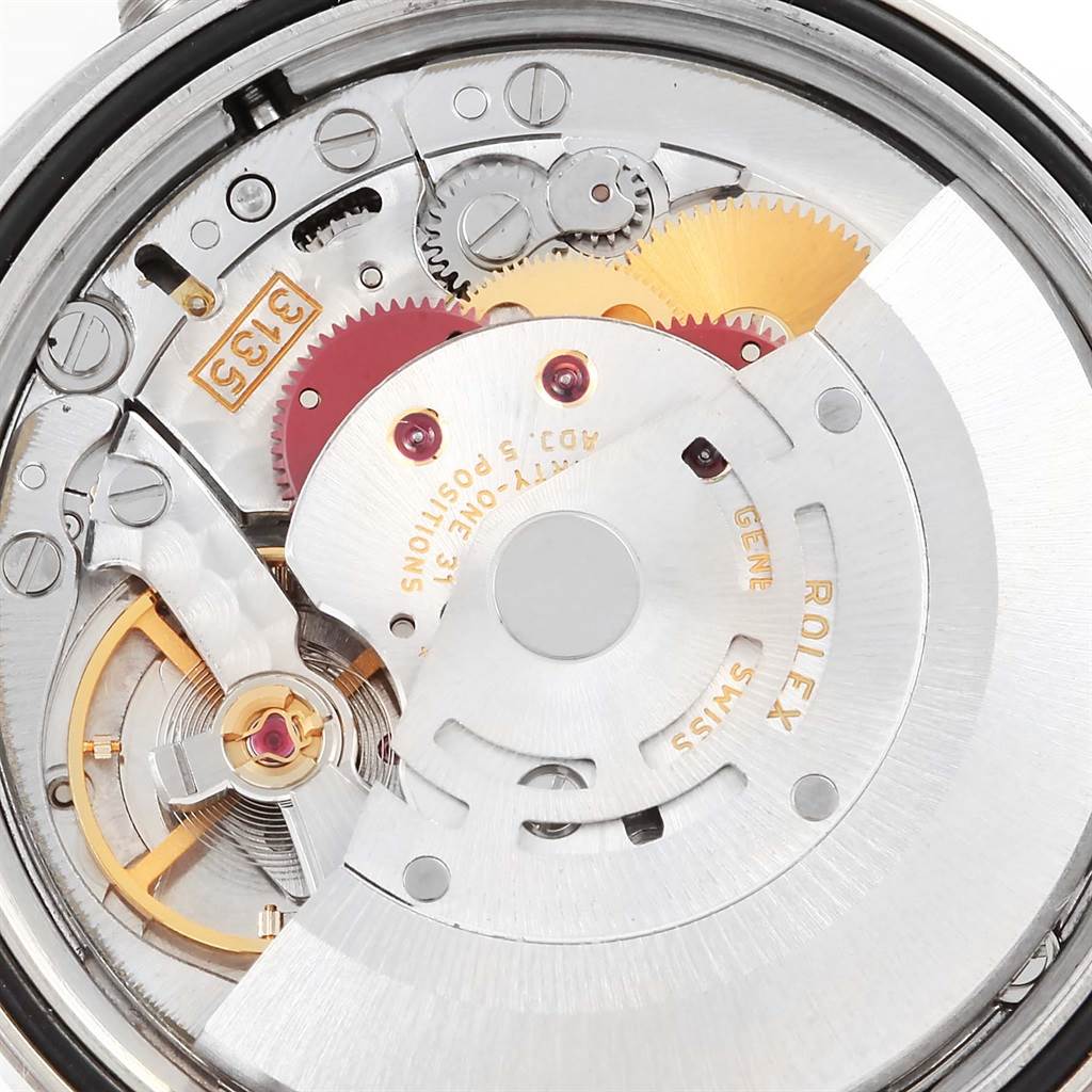 This image shows the movement and internal mechanism of a Rolex Datejust 16234 Men
s Stainless Steel Silver Dial 16234 Men
s Stainless Steel Silver Dial watch from a close-up angle, revealing gears and components.
