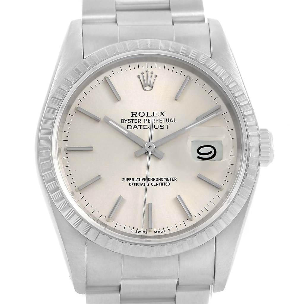 The image shows a front view of a Rolex Datejust 16220 Men
s Stainless Steel Silver Dial 16220 Men
s Stainless Steel Silver Dial watch, displaying its face, bezel, and parts of the bracelet.