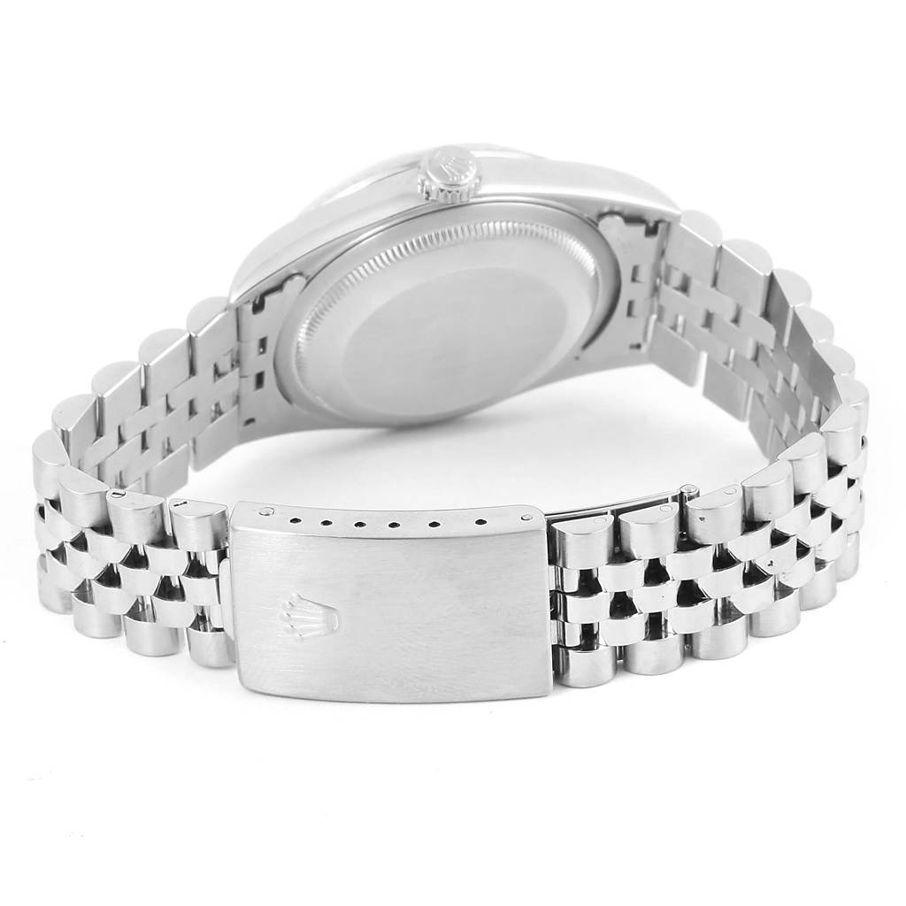 The image shows the rear view of a Rolex Datejust 16234 Men's Stainless Steel Blue Dial 16234 Men's Stainless Steel Blue Dial watch, highlighting its case back and jubilee bracelet with a clasp.