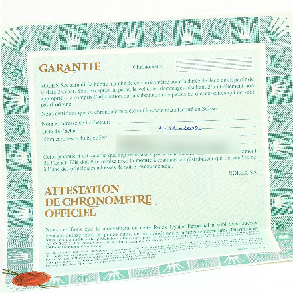 This image shows the warranty certificate for a Rolex Datejust 16220 Men
s Stainless Steel White Dial 16220 Men
s Stainless Steel White Dial watch.