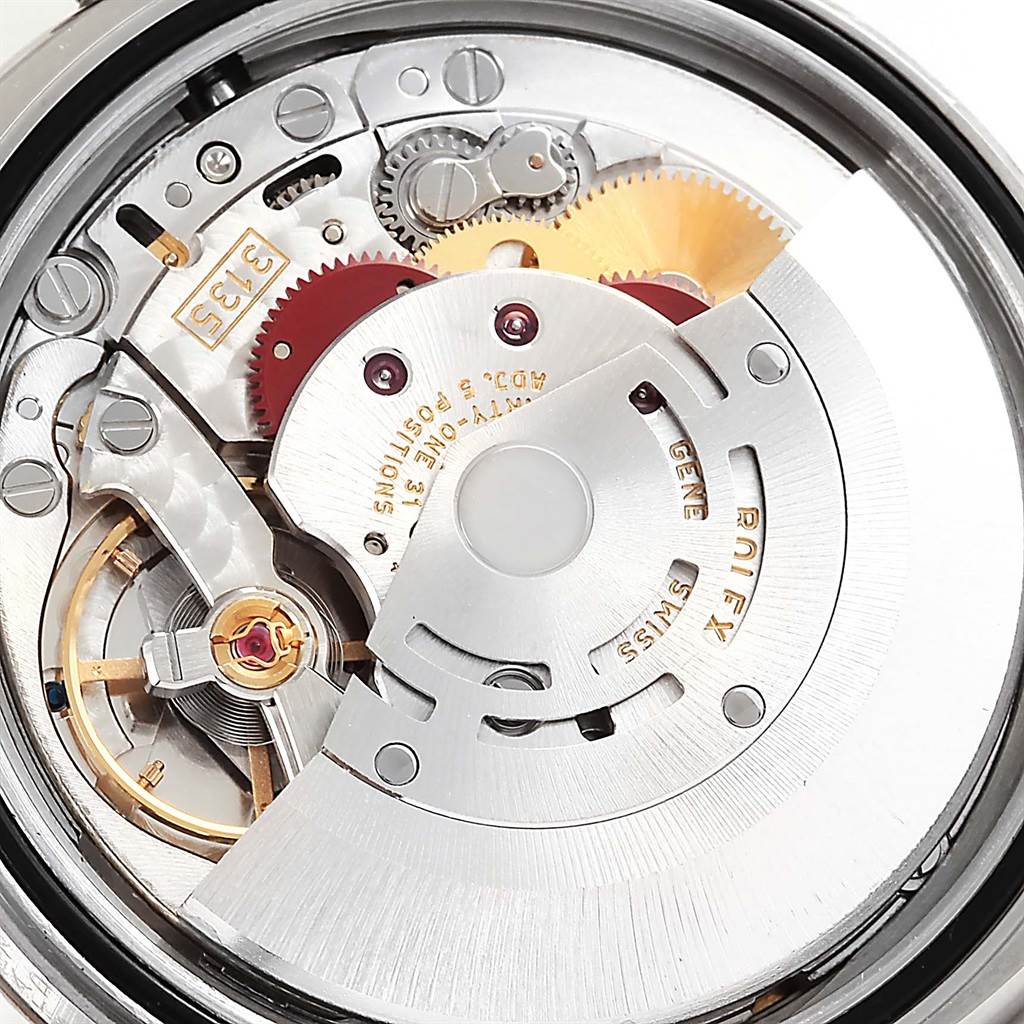 This image shows the intricate movement components of a Rolex Datejust 116234 Men's Stainless Steel Blue Dial 116234 Men's Stainless Steel Blue Dial watch from the back.