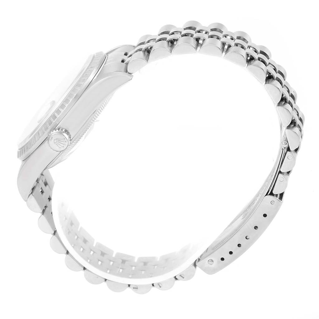 The image shows a side angle of the Rolex Datejust 16220 Men
s Stainless Steel Silver Dial 16220 Men
s Stainless Steel Silver Dial, focusing on the watch case and bracelet.