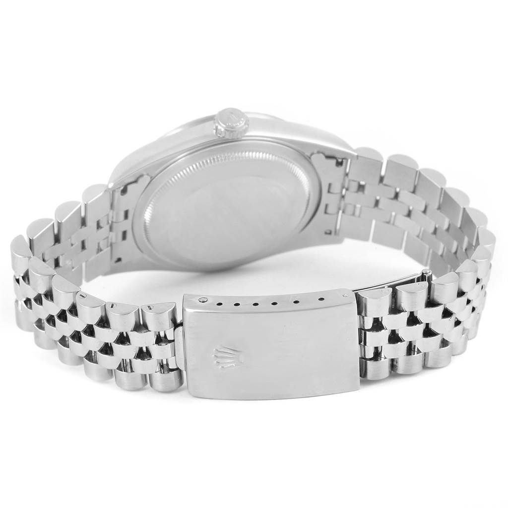 The image shows the back case and bracelet clasp of a Rolex Datejust 16220 Men
s Stainless Steel Silver Dial 16220 Men
s Stainless Steel Silver Dial watch at a rear angle.