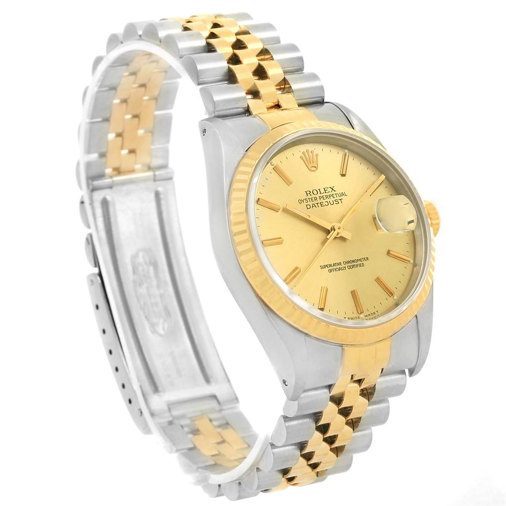 This image shows a Rolex Datejust 16233 Men's Steel and Gold (two tone) Champagne Dial 16233 Men's Steel and Gold (two tone) Champagne Dial watch at a slight angle, highlighting the dial, bezel, and two-tone metal bracelet.