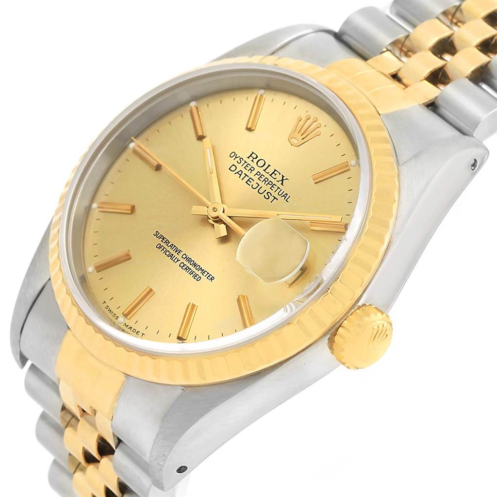 The image shows a close-up angled view of a Rolex Datejust 16233 Men's Steel and Gold (two tone) Champagne Dial 16233 Men's Steel and Gold (two tone) Champagne Dial watch, highlighting the gold dial, bezel, crown, and two-tone bracelet.
