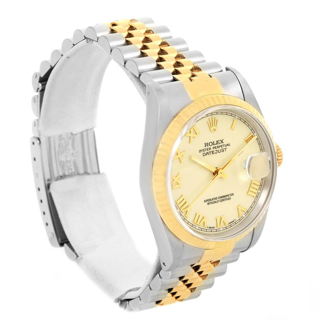 This image shows a Rolex Datejust 16233 Men's Steel and Gold (two tone) Beige Dial 16233 Men's Steel and Gold (two tone) Beige Dial watch angled from the front left, highlighting its bezel, dial, and two-tone bracelet.